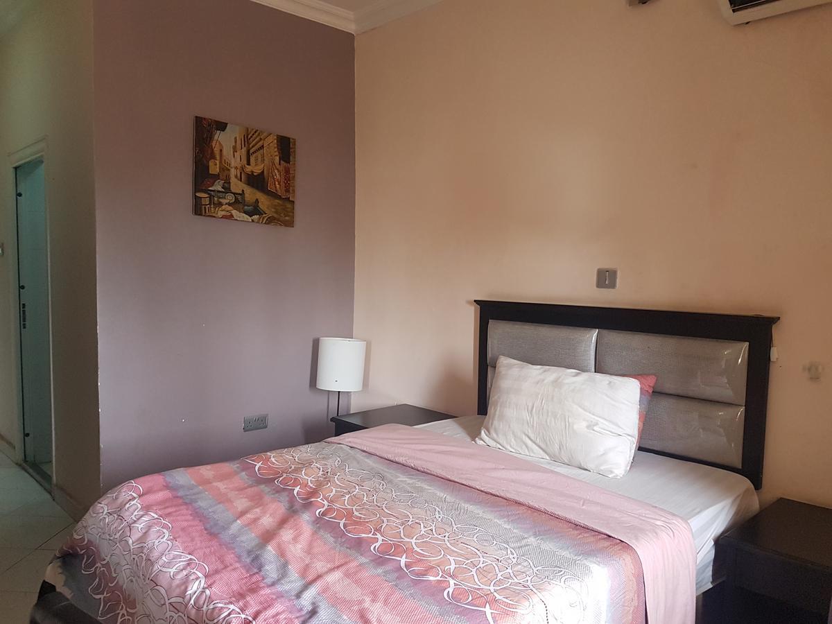 Grand Bank Link Hotel Otta Екстериор снимка