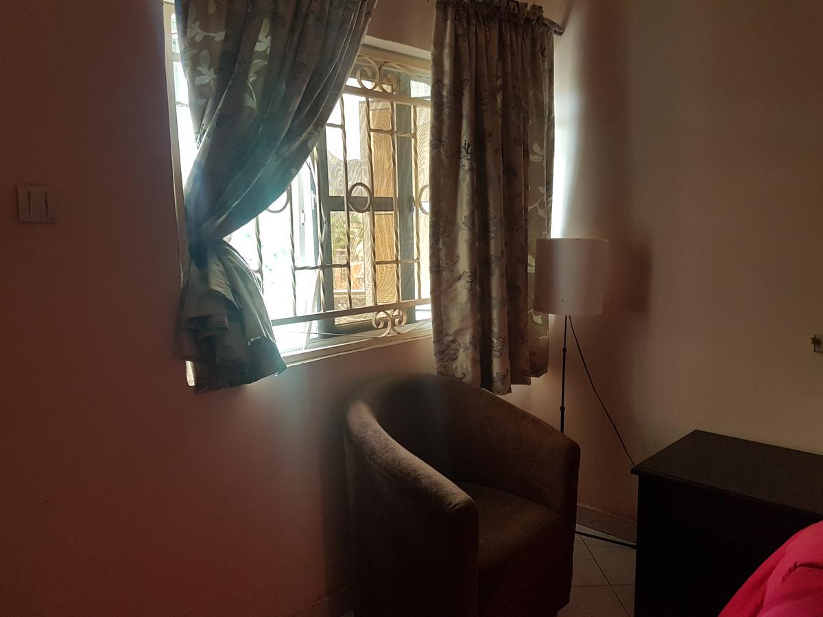 Grand Bank Link Hotel Otta Екстериор снимка