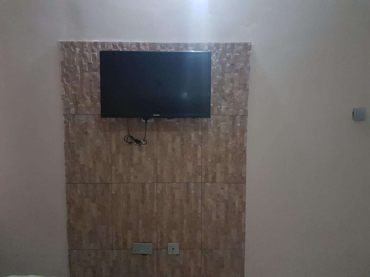 Grand Bank Link Hotel Otta Екстериор снимка