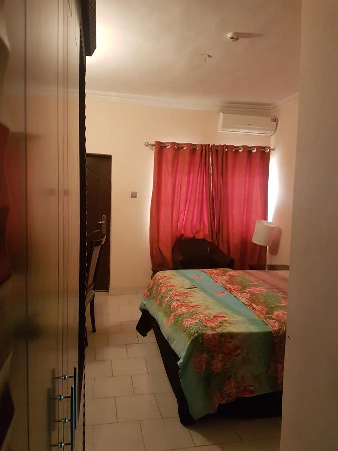 Grand Bank Link Hotel Otta Екстериор снимка