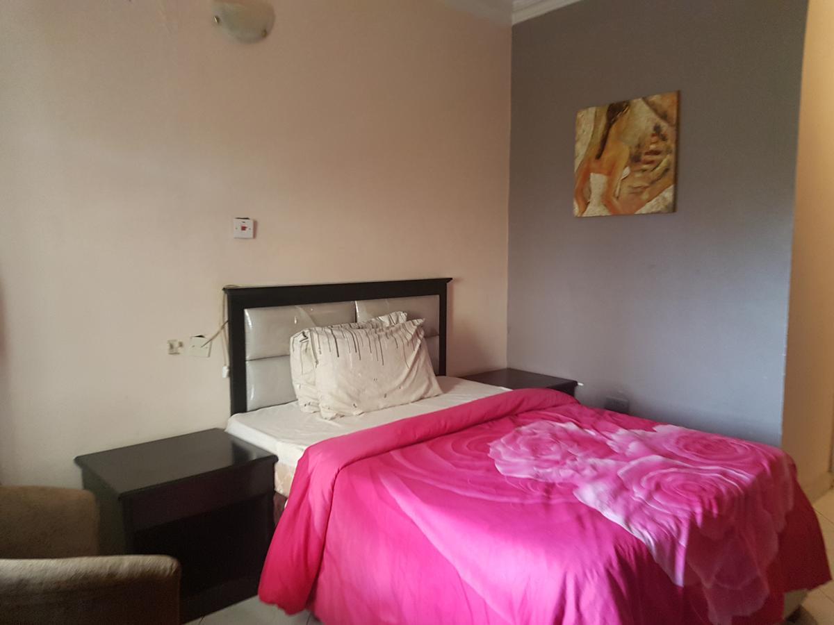 Grand Bank Link Hotel Otta Екстериор снимка
