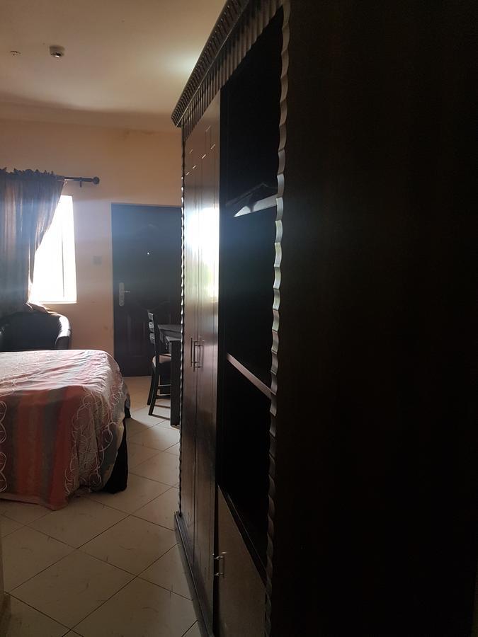 Grand Bank Link Hotel Otta Екстериор снимка