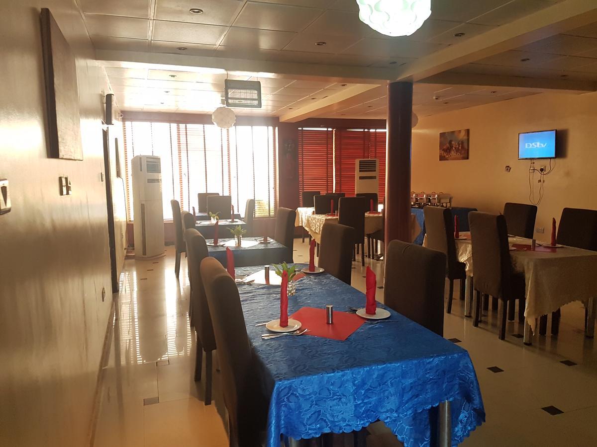 Grand Bank Link Hotel Otta Екстериор снимка
